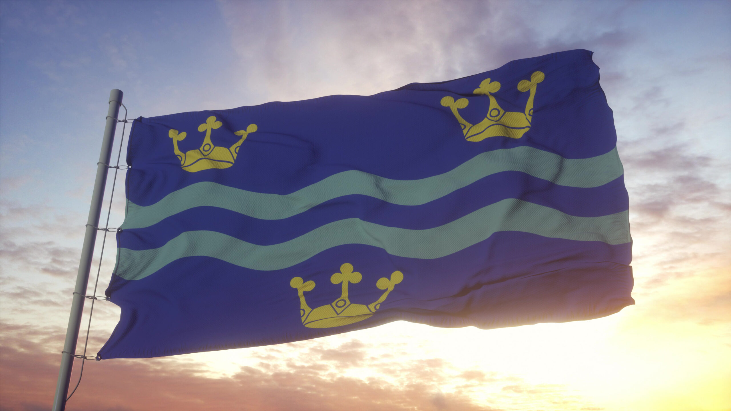 Cambridgeshire flag, England, waving in the wind, sky and sun background. 3d rendering.